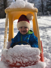 Load image into Gallery viewer, Adorable toddler wearing his snowsuit and Santa hat whiel playing ion the snow with his Little Tykes Coupe
