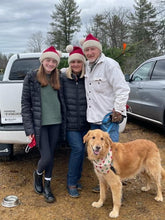 Load image into Gallery viewer, Mom, Dad, daughter &amp; dod posing in the Santa hats on their way to cut down a Christmas tree
