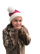 Load image into Gallery viewer, Young girl wearing leopard print coat and wearing her Santa hat
